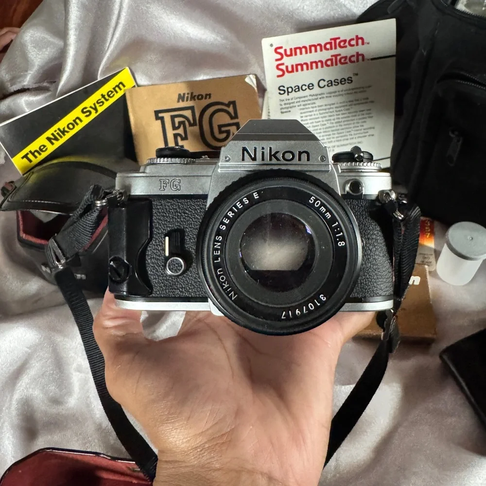 FG Nikon 35mm SLR camera with accessories
